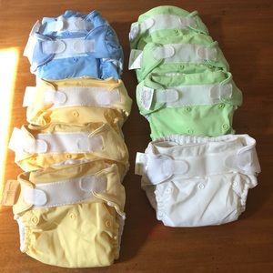 9 Bum Genius cloth diapers with inserts included